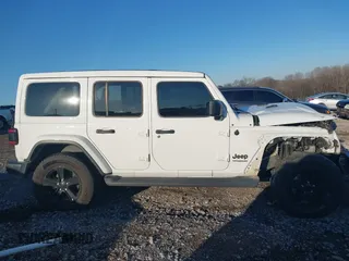 2021 Jeep Wrangler Unlimited Sahara with VIN 1C4HJXEG1MW597905, listed as a IAAI auction lot 41327138 with Not provided miles and . Bid and sale history available at DreamBid. Image 14.