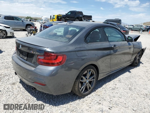 2015 BMW 2 Series M235i with VIN WBA1J7C55FV253647, listed as a Copart auction lot 60231395 with 57,639 mi miles and Salvage title. Bid and sale history available at DreamBid. Image 3.