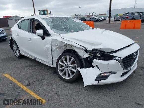 2017 Mazda 3 Touring with VIN 3MZBN1V72HM121902, listed as a IAAI auction lot 39193644 with 40,113 mi miles and . Bid and sale history available at DreamBid. Image 1.