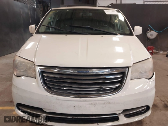 2013 Chrysler Town & Country Touring z VIN 2C4RC1BG9DR656630, wystawiony jako IAAI lot #42141980 z przebiegiem 150 303 mil mil oraz . Historia ofert i sprzedaży dostępna na DreamBid. Obrazek 12.
