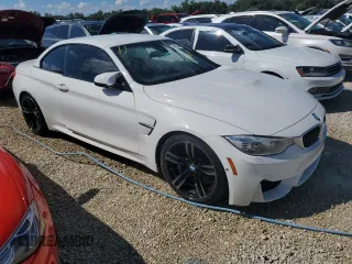 2015 BMW M4 with VIN WBS3U9C56FP968142, listed as a Copart auction lot 74034884 with Not Provided miles and Salvage Title. Bid and sale history available at carsss.com. Image 4.