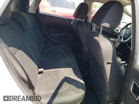 2015 Ford Fiesta SE z VIN 3FADP4EJ7FM169000, wystawiony jako Copart lot #64402674 z przebiegiem 191 221 mil mil oraz Szkoda całkowita • Salvage title. Historia ofert i sprzedaży dostępna na DreamBid. Obrazek 10.