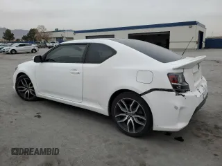 2014 Scion tC z VIN JTKJF5C7XE3079538, wystawiony jako Copart lot #85018414 z przebiegiem 136 905 mil mil oraz Czysty tytuł • Clean title. Historia ofert i sprzedaży dostępna na DreamBid. Obrazek 2.