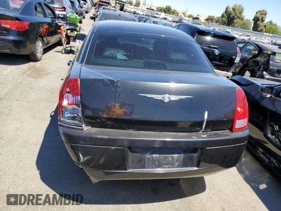 2005 Chrysler 300 with VIN 2C3JA43R95H161005, listed as a Copart auction lot 60951874 with 147,903 mi miles and Salvage Title. Bid and sale history available at carsss.com. Image 6.