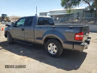 2006 Ford F-150 STX with VIN 1FTRX02W06KB84129, listed as a Copart auction lot 60349115 with 132,768 mi miles and Salvage title. Bid and sale history available at DreamBid. Image 2.