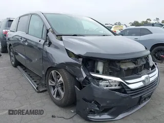2018 Honda Odyssey Touring with VIN 5FNRL6H88JB062213, listed as a IAAI auction lot 42489379 with 90,578 mi miles and . Bid and sale history available at DreamBid. Image 6.