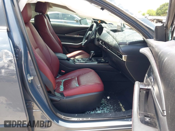 2022 Mazda CX-30 S Carbon Edition with VIN 3MVDMBCL6NM410330, listed as a IAAI auction lot 42107426 with 30,277 mi miles and . Bid and sale history available at DreamBid. Image 5.