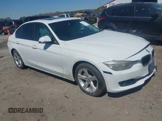 2015 BMW 3 Series 328i xDrive with VIN WBA3B5G59FNS18811, listed as a IAAI auction lot 41867015 with 147,748 mi miles. Bid and sale history available at carsss.com. Image 1.