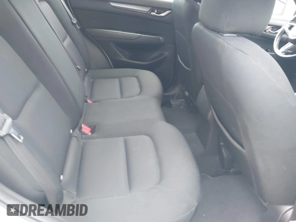 2019 Mazda CX-5 Sport with VIN JM3KFABM4K1565787, listed as a IAAI auction lot 42054585 with 80,580 mi miles and . Bid and sale history available at DreamBid. Image 8.