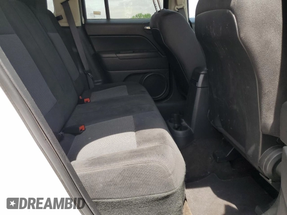 2016 Jeep Patriot Sport z VIN 1C4NJPBA0GD621808, wystawiony jako Copart lot #56292375 z przebiegiem 134 310 mil mil oraz Szkoda całkowita • Salvage title. Historia ofert i sprzedaży dostępna na DreamBid. Obrazek 11.
