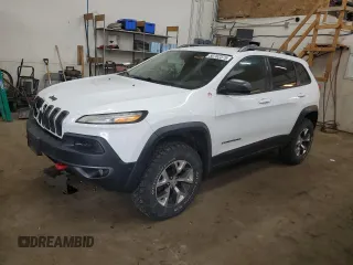 2014 Jeep Cherokee Trailhawk z VIN 1C4PJMBS0EW129300, wystawiony jako Copart lot #50782375 z przebiegiem 115 808 mil mil oraz Szkody całkowita. Historia ofert i sprzedaży dostępna na DreamBid. Obrazek 1.