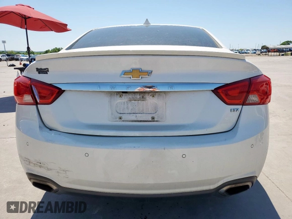 2014 Chevrolet Impala LTZ with VIN 1G1155S32EU149061, listed as a Copart auction lot 52488535 with 106,815 mi miles and Salvage title. Bid and sale history available at DreamBid. Image 6.