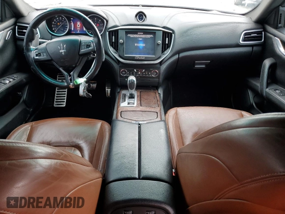2014 Maserati Ghibli z VIN ZAM57XSA9E1096594, wystawiony jako Copart lot #47187285 z przebiegiem 114 050 mil mil oraz Szkody całkowita. Historia ofert i sprzedaży dostępna na DreamBid. Obrazek 8.