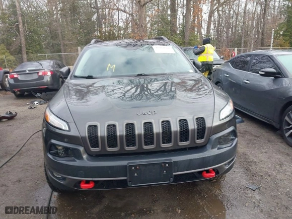 2018 Jeep Cherokee Trailhawk with VIN 1C4PJMBB3JD516090, listed as a IAAI auction lot 41460960 with 97,639 mi miles. Bid and sale history available at carsss.com. Image 12.
