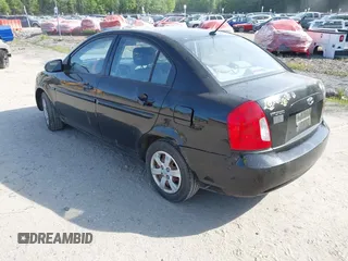 2009 Hyundai Accent Auto GLS z VIN KMHCN46C39U334712, wystawiony jako IAAI lot #42334874 z przebiegiem 193 090 mil mil oraz . Historia ofert i sprzedaży dostępna na DreamBid. Obrazek 3.