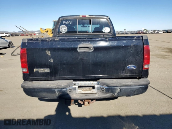 2003 Ford Super Duty F-250 XL with VIN 1FTNW20P23EB90968, listed as a Copart auction lot 41882395 with 215,373 mi miles and Salvage Title. Bid and sale history available at carsss.com. Image 6.