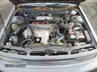 1988 Toyota Camry LE z VIN JT2SV22E0J0237998, wystawiony jako Copart lot #78850584 z przebiegiem 165 880 mil mil oraz Szkoda całkowita • Salvage title. Historia ofert i sprzedaży dostępna na DreamBid. Obrazek 11.