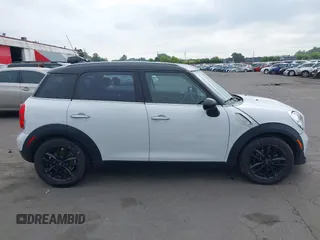 2012 MINI Countryman with VIN WMWZB3C57CWM04258, listed as a IAAI auction lot 42116867 with 168,550 mi miles and . Bid and sale history available at DreamBid. Image 13.