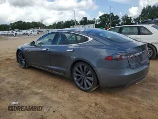 2013 Tesla Model S с VIN 5YJSA1CG6DFP21533, выставлен на аукционе Copart как лот 60850815 с пробегом 24 220 миль миль и На запчасти • Non repairable. История ставок и продаж доступна на DreamBid. Изображение 2.