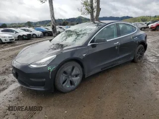 2019 Tesla Model 3 Long Range with VIN 5YJ3E1EB8KF384533, listed as a Copart auction lot 48557255 with 73,768 mi miles and Salvage Title. Bid and sale history available at carsss.com. Image 1.