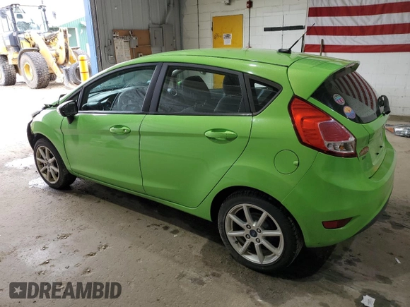 2015 Ford Fiesta SE z VIN 3FADP4EJ2FM215834, wystawiony jako Copart lot #58052045 z przebiegiem 99 842 mil mil oraz Czysty tytuł • Clean title. Historia ofert i sprzedaży dostępna na DreamBid. Obrazek 2.