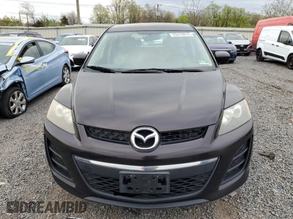 2010 Mazda CX-7 SV z VIN JM3ER2WMXA0341433, wystawiony jako Copart lot #53474815 z przebiegiem 106 410 mil mil oraz Czysty tytuł • Clean title. Historia ofert i sprzedaży dostępna na DreamBid. Obrazek 5.