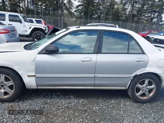 2002 Mazda Protege DX with VIN JM1BJ225520542854, listed as a IAAI auction lot 41955679 with 161,338 mi miles and . Bid and sale history available at DreamBid. Image 14.