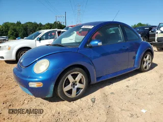 2004 Volkswagen Beetle GL with VIN 3VWBK31C74M406435, listed as a Copart auction lot 58246475 with 157,938 mi miles and Salvage title. Bid and sale history available at DreamBid. Image 1.
