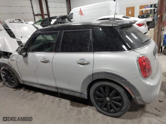 2015 MINI Cooper Hardtop 4 Door S with VIN WMWXU3C56F2B66449, listed as a IAAI auction lot 41296784 with 53,589 mi miles. Bid and sale history available at carsss.com. Image 14.