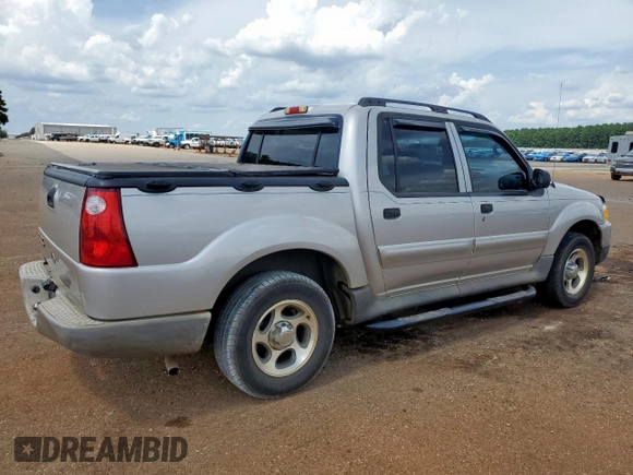 2005 Ford Explorer Sport Trac XLS with VIN 1FMZU67K95UA94980, listed as a Copart auction lot 63490315 with 126,737 mi miles and Salvage title. Bid and sale history available at DreamBid. Image 3.