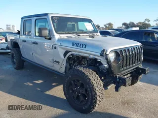 2022 Jeep Gladiator Willys with VIN 1C6HJTAG4NL132558, listed as a IAAI auction lot 41626851 with 28,251 mi miles and . Bid and sale history available at DreamBid. Image 1.