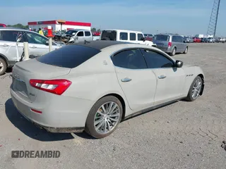 2015 Maserati Ghibli S Q4 with VIN ZAM57RTA7F1138207, listed as a IAAI auction lot 42573567 with Not provided miles and . Bid and sale history available at DreamBid. Image 4.