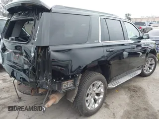 2015 GMC Yukon SLT with VIN 1GKS1BKC3FR129173, listed as a IAAI auction lot 41795585 with 97,893 mi miles. Bid and sale history available at carsss.com. Image 4.