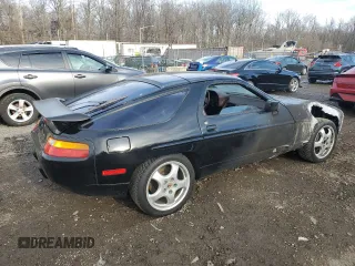 1988 Porsche 928 z VIN WP0JB0921JS860322, wystawiony jako Copart lot #43746455 z przebiegiem 136 427 mil mil oraz Szkody całkowita. Historia ofert i sprzedaży dostępna na DreamBid. Obrazek 3.