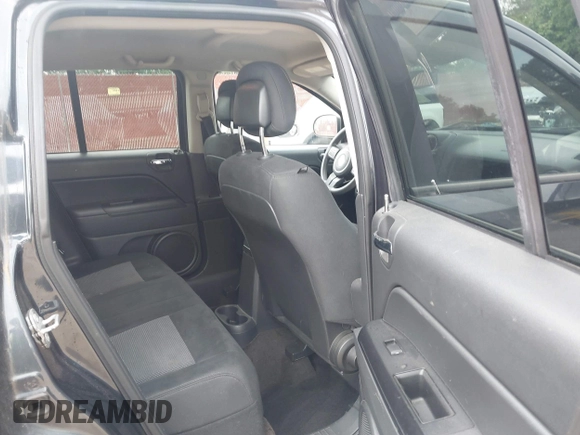 2014 Jeep Compass Sport with VIN 1C4NJCBA1ED725875, listed as a IAAI auction lot 42118863 with 133,136 mi miles. Bid and sale history available at carsss.com. Image 8.