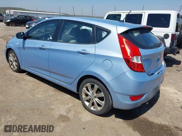 2012 Hyundai Accent SE with VIN KMHCU5AE0CU022050, listed as a IAAI auction lot 41955452 with 140,460 mi miles. Bid and sale history available at carsss.com. Image 3.