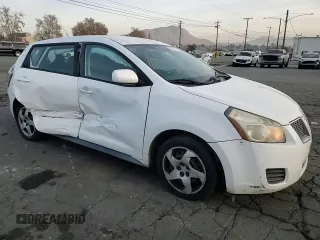 2009 Pontiac Vibe w/1SA with VIN 5Y2SL67809Z439030, listed as a Copart auction lot 87419194 with 104,518 mi miles and Salvage Title. Bid and sale history available at carsss.com. Image 11.