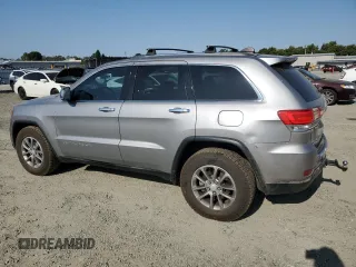 2014 Jeep Grand Cherokee Limited with VIN 1C4RJFBM1EC416751, listed as a Copart auction lot 59562825 with 171,766 mi miles and Salvage title. Bid and sale history available at DreamBid. Image 2.