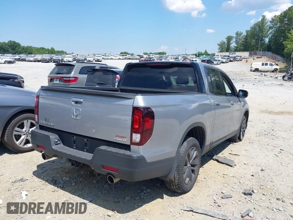 2021 Honda Ridgeline Sport with VIN 5FPYK3F10MB021413, listed as a IAAI auction lot 39847416 with 28,044 mi miles and . Bid and sale history available at DreamBid. Image 4.