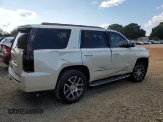 2015 GMC Yukon SLT with VIN 1GKS2BKC1FR736203, listed as a Copart auction lot 67977694 with 178,781 mi miles and Salvage Title. Bid and sale history available at carsss.com. Image 3.