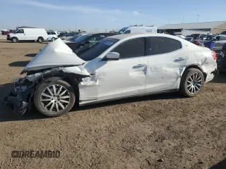 2014 Maserati Ghibli S Q4 z VIN ZAM57RTAXE1092970, wystawiony jako Copart lot #48617585 z przebiegiem 92 976 mil mil oraz Szkody całkowita. Historia ofert i sprzedaży dostępna na DreamBid. Obrazek 1.