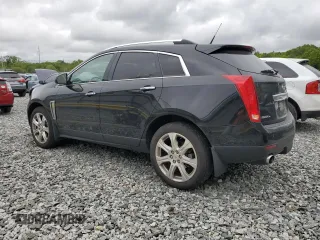 2014 Cadillac SRX Performance Collection with VIN 3GYFNFE33ES687941, listed as a Copart auction lot 57726675 with 164,059 mi miles and Clean title. Bid and sale history available at DreamBid. Image 2.