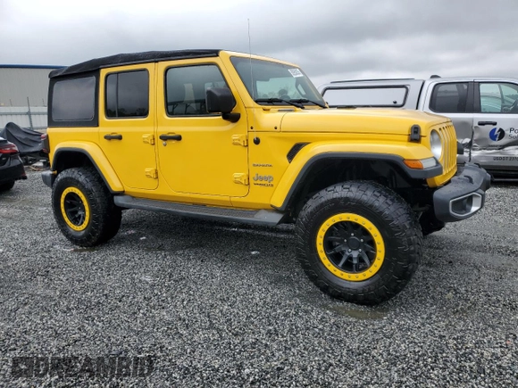 2019 Jeep Wrangler Unlimited Sahara with VIN 1C4HJXEN2KW523906, listed as a Copart auction lot 50950035 with 98,013 mi miles and Salvage Title. Bid and sale history available at carsss.com. Image 4.