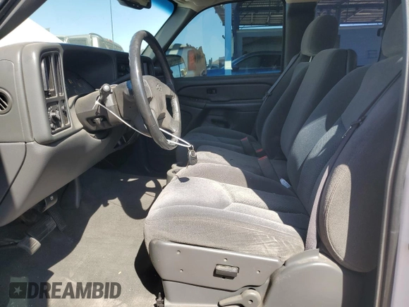 2005 Chevrolet Silverado 1500 LS with VIN 2GCEC19TX51113580, listed as a Copart auction lot 51297345 with 64,541 mi miles and Salvage Title. Bid and sale history available at DreamBid. Image 7.