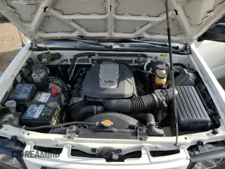 2001 Isuzu Rodeo z VIN 4S2CK57W614340766, wystawiony jako Copart lot #73891524 z przebiegiem 124 446 mil mil oraz Nie do naprawy. Historia ofert i sprzedaży dostępna na DreamBid. Obrazek 11.