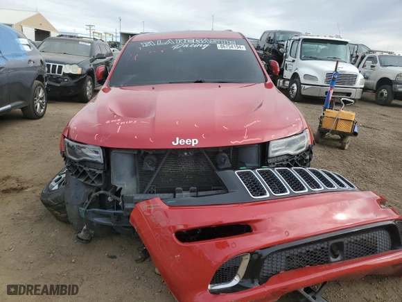 2015 Jeep Grand Cherokee SRT with VIN 1C4RJFDJ4FC136861, listed as a Copart auction lot 86754194 with 98,262 mi miles and Salvage Title. Bid and sale history available at carsss.com. Image 5.
