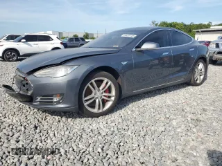 2014 Tesla Model S 60 z VIN 5YJSA1H1XEFP32590, wystawiony jako Copart lot #64424145 z przebiegiem Nie podano mil oraz Czysty tytuł • Clean title. Historia ofert i sprzedaży dostępna na DreamBid. Obrazek 1.
