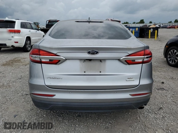 2020 Ford Fusion SE with VIN 3FA6P0HDXLR113882, listed as a Copart auction lot 57677215 with 104,459 mi miles and Salvage title. Bid and sale history available at DreamBid. Image 6.