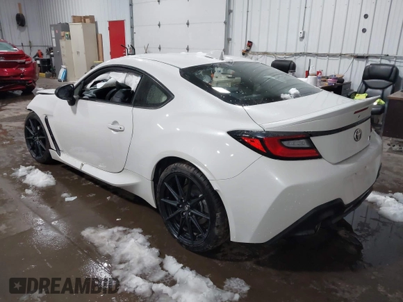 2023 Toyota 86 Premium z VIN JF1ZNBE1XP9765718, wystawiony jako IAAI lot #41945549 z przebiegiem 12 942 mil mil oraz . Historia ofert i sprzedaży dostępna na DreamBid. Obrazek 3.