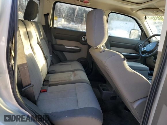2008 Dodge Nitro SLT z VIN 1D8GU58K68W211350, wystawiony jako Copart lot #86813294 z przebiegiem Nie podano mil oraz Szkoda całkowita • Salvage title. Historia ofert i sprzedaży dostępna na DreamBid. Obrazek 10.
